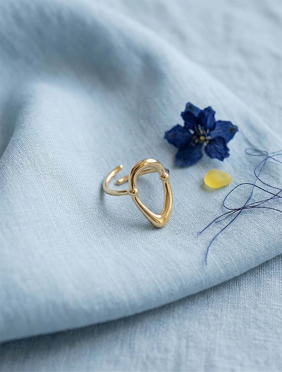 Bague ajustable motif oval ajouré - Or