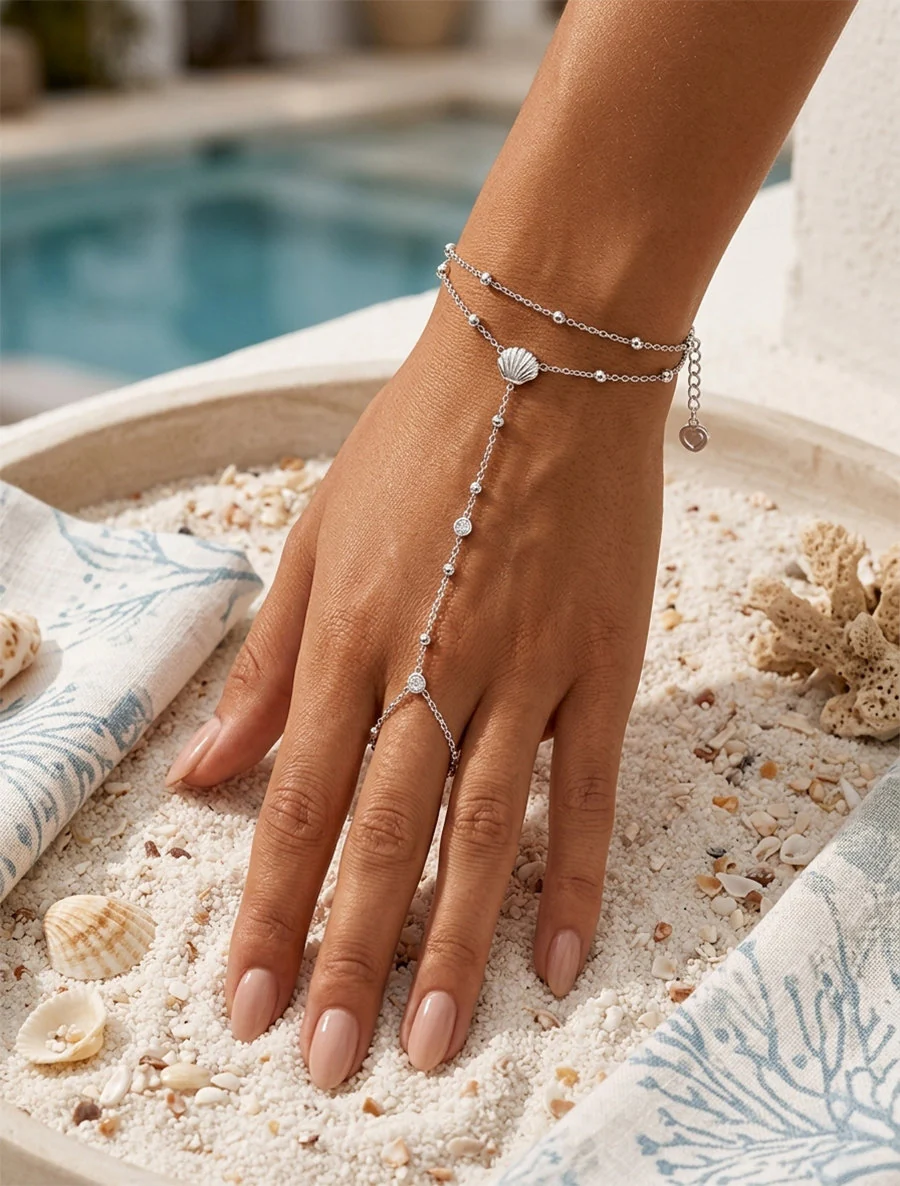 Chaîne de main coquillage et zircon blanc - Argent