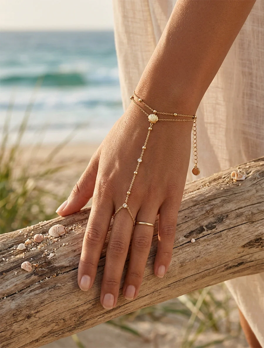 Chaîne de main coquillage et zircon blanc - Or