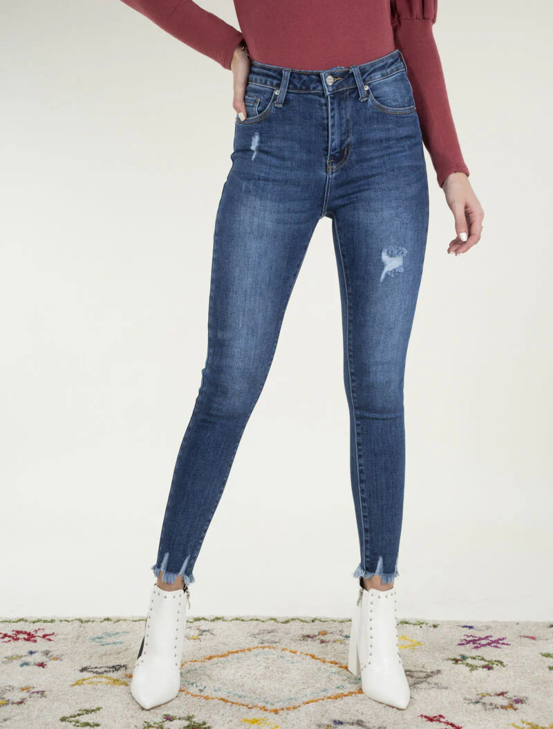Jean skinny à bords effilochés - bleu denim