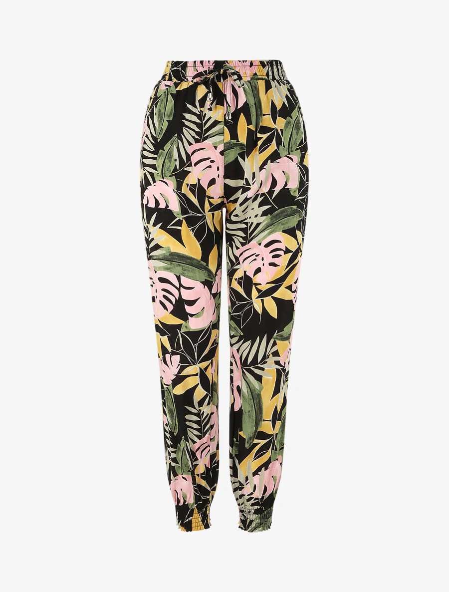 Pantalon fluide imprimé fleurs tropicales à bords élastiqués - Noir